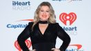 ‘The Voice’ Coach Kelly Clarkson Has Some Beef With iHeartRadio Despite Performing At Their Festival