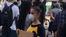 Watch Masked Ariana Grande Trying To Blend In The BLM Protests With Her Own Sign