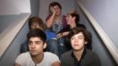WATCH One Direction Never Seen Videos Where They Get Candid About Their Awkward First Kiss
