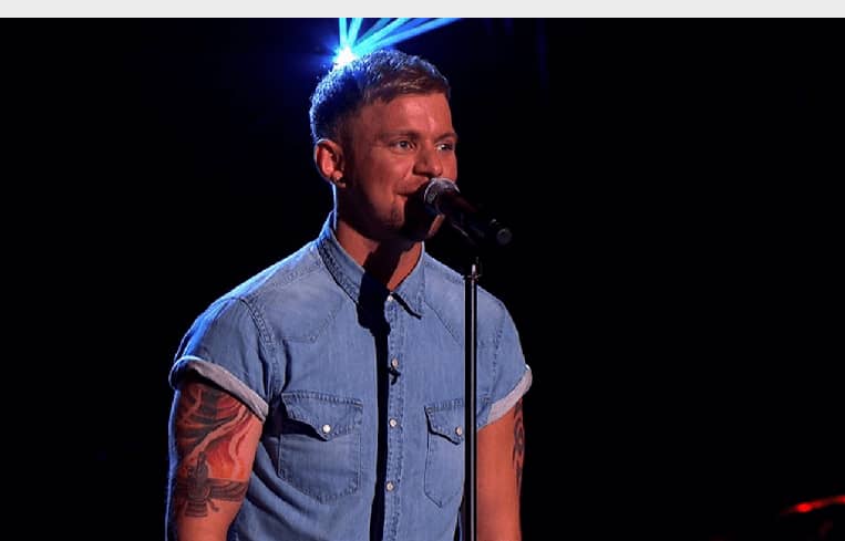 WATCH Singer Perform Re-Mastered Version Of Coach’s Song On ‘The Voice UK’