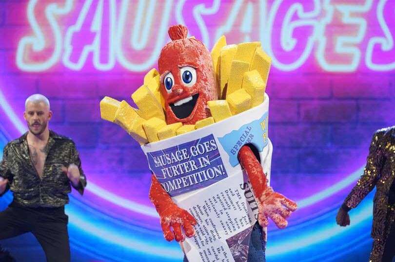 Who Is The Sausage On ‘The Masked Singer’ UK? Clues Decoded + The Mask Revealed
