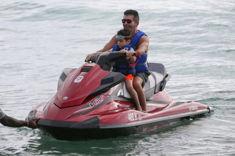 Simon Cowell Daddy Shamed By Comedian For Not Changing Eric Cowell’s Diapers Even Once