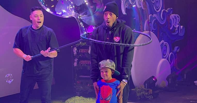 Nick Cannon and son play with bubbles
