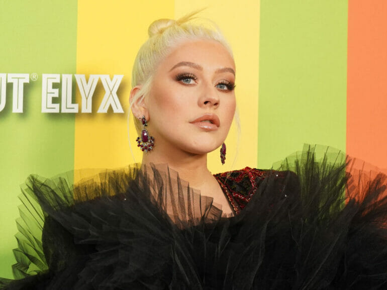 Christina Aguilera Sizzles in Topless Photos Promoting Ladyland Festival