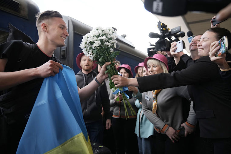 Ihor Didenchuk of the Kalush Orchestra is welcomed home to Kyiv