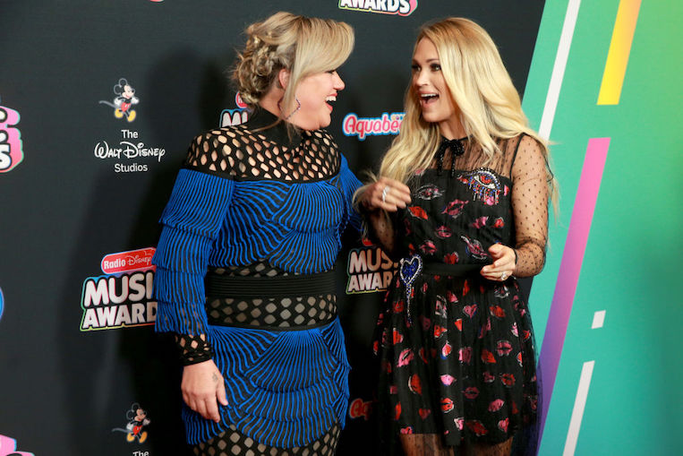 Kelly Clarkson and Carrie Underwood at the 2018 Radio Disney Music Awards
