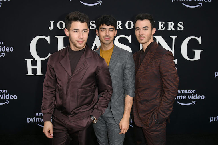 The Jonas Brothers on the 'Chasing Happiness' Red Carpet