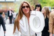 Shakira Makes a Statement in ‘NO’ Dress at Paris Fashion Week